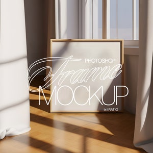 May include: A wooden frame mockup with a white background and the text "PHOTOSHOP Frame MOCKUP 1x1 RATIO" in the bottom right corner. The frame is sitting on a wooden floor with white curtains in the background.