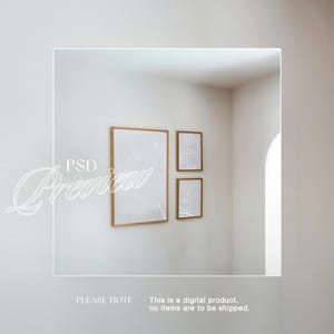 May include: Three framed art prints with wooden frames are displayed on a white wall. The frames vary in size, with a large rectangular print and two smaller square prints. The image includes the text "PSD Preview" and "PLEASE HOTE This is a digital product. no items are to be shipped."