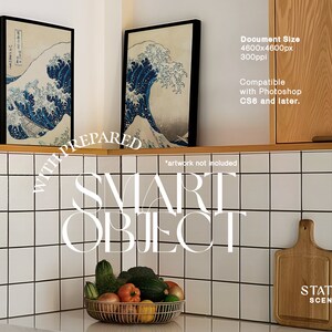 May include: Two framed prints of a Japanese wave design, hanging on a white tiled wall in a kitchen setting. The text "WITH PREPARED SMART OBJECT" is superimposed on the image. A wooden chopping board and a bowl of fruit are on the counter below the prints.