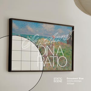 May include: A framed painting depicting a seascape with a blue sky, white clouds, and a distant shoreline. The painting is in a dark brown frame and is hanging on a white wall. The text "Standard DIN A Ratio" is superimposed on the image.