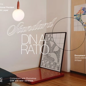May include: A black and white line art print with the text "DINA RATIO" and a geometric design. The print is framed and hanging on a wall in a room with a wooden floor. The document size is 4400x4400 pixels at 300ppi.