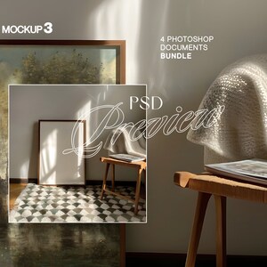May include: A mockup of a framed painting with a white frame and a white mount. The painting depicts a landscape with trees and water. The frame is resting on a rug with a geometric pattern. The rug is in front of a wall with a white frame and a white mount. The frame is empty. The wall is in front of a window with sunlight streaming through it. The window is in front of a white blanket. The blanket is on a wooden stool. The stool is in front of a wall with the text "4 Photoshop Documents Bundle" on it. The text is in black and white. The text is in a sans-serif font. The text is in all caps. The text is centred on the wall. The text is in the upper right corner of the image. The image is in a warm colour palette. The image is in a horizontal format.