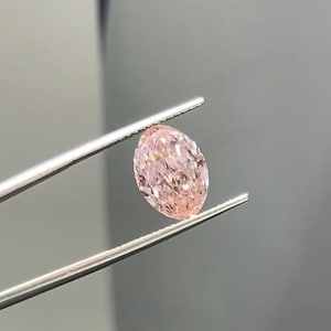 Stunning 4.79 Carat Lab-Grown Light Pink Oval Cut Diamond IGI Certified VVS2 Clarity Ethical & Sustainable Gemstone Making Jewelry Ring
