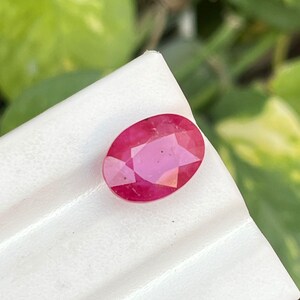 10.50 Cts. Natural Ruby Glass Filled Oval Cut Loose Stone (13x10x6 MM)