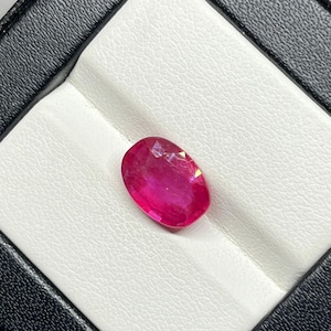 4 Carat Oval Cut Ruby Gemstone: Glass Filled, 10x7x4 mm