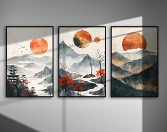 May include: Three framed prints with a Japanese-inspired landscape design. Each print features a mountain range with a red and orange sun in the sky. The middle print has a river flowing through the mountains. The prints are perfect for adding a touch of nature to your home decor.