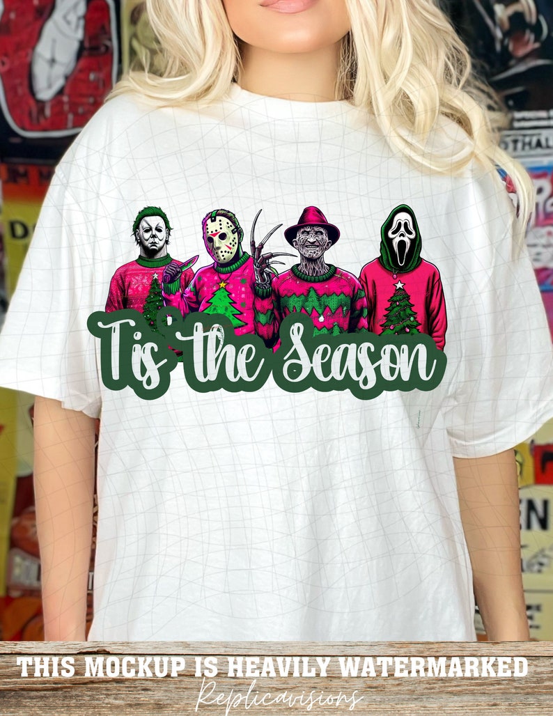 May include: White t-shirt with a graphic of four horror movie characters wearing Christmas sweaters. The text "Tis' the Season" is printed below the characters.