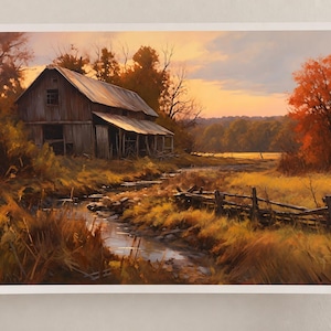 May include: A rectangular art print depicting a rustic wooden barn situated beside a winding stream in a rural landscape. The scene features golden autumn foliage, a weathered wooden fence, and a warm sunset sky with orange and yellow hues.