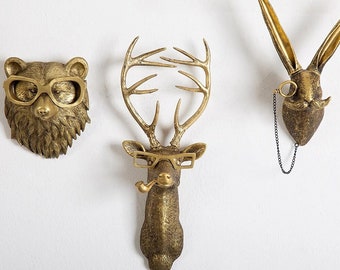 Bronzen dierenkop, bronzen dierenfiguren, bronzen hertenkop, muurfiguren, huismuurornamenten
