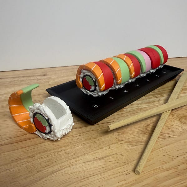 Sushi Pill Organizer: 7-Day Travel Medicine Keychain