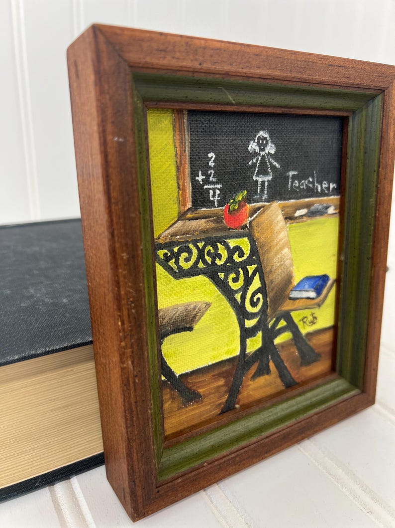 Signed folk art piece with warm wood and green trim