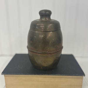 Vintage Brass Lidded Container | Patinated Barrel Shape Jar | 6” Tall Brass Storage Canister | Rustic Cottagecore Shelf Decor | Brass Vase