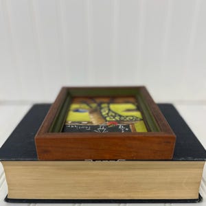 Miniature signed artwork with nostalgic academic design