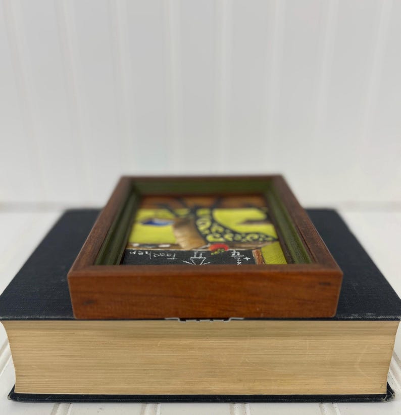 Miniature signed artwork with nostalgic academic design