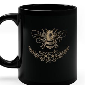 Bee Coffee Mug: Floral Honeybee Design, 11oz Black Mug