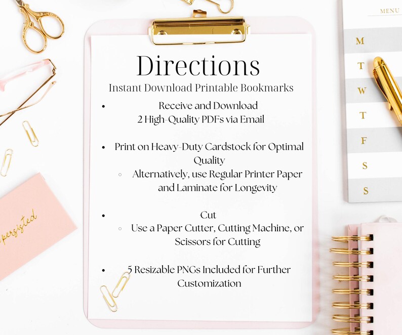 May include: A pink clipboard with gold hardware holds a white paper with instructions for printable bookmarks. The text includes directions for downloading, printing, and cutting. Gold scissors, paper clips, and a pen are scattered around the clipboard.