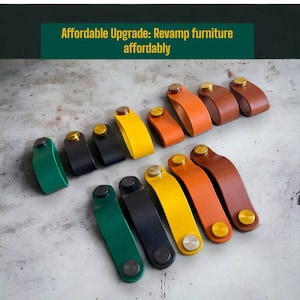 May include: Assortment of leather drawer pulls in various colours, including green, black, yellow, orange, and brown. Each pull has a brass screw.  Affordable Upgrade: Revamp furniture affordably.