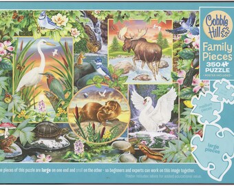 River Magic, a 350 piece unopened puzzl for the whole family.... beautiful river scene: plants and animals including swan, moose, otter, etc