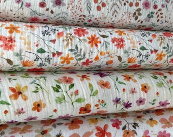 Katoenen mousseline met lentebloemen: lichtgewicht materiaal van dubbel gekreukt gaas