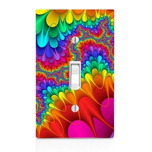 May include: A vibrant light switch cover featuring a colorful fractal design in shades of red, orange, yellow, green, blue, and purple. The switch is white, with the word "OFF" printed on it. The cover is rectangular.