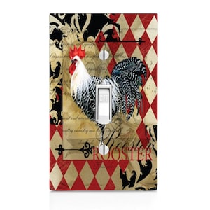 May include: A light switch cover with a vintage design featuring a rooster with a red comb and black and white feathers. The background is a red and white diamond pattern with a black and gold floral design. The text "Rooster" is printed in black.