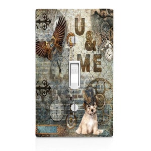 May include: A light switch cover with a steampunk design featuring a dog wearing a top hat, gears, clocks, and the words "U & ME".