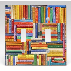 May include: A double light switch wall plate featuring a colourful, multi-directional collage of book spines with various sewing-themed titles like Let It Sew, Hand Quilting, and Diary of a Fabricaholic. The design includes vertical and horizontal books.