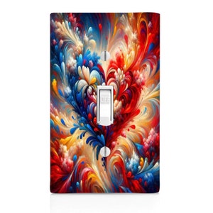 May include: A light switch cover with a colorful abstract design featuring swirls of red, blue, yellow, and white. The design resembles a heart shape.