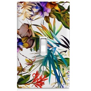 May include: A light switch cover with a colorful floral design featuring tropical leaves and flowers in shades of red, blue, green, yellow, and purple.