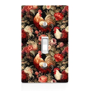 May include: A decorative light switch cover featuring a floral and rooster design. The cover has a black background with red, cream, and brown flowers and roosters. The switch is white and reads "OFF".