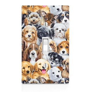 May include: A light switch cover featuring a colorful pattern of many different dog breeds. The cover has a white light switch with the word "OFF" printed on it.