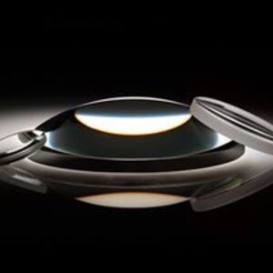 May include: Three clear glass lenses of different sizes. The largest lens is a convex lens, the medium lens is a plano-convex lens, and the smallest lens is a plano-concave lens.
