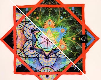 May include: A colorful, geometric design on a square fabric, featuring intricate patterns in shades of blue, green, orange, and purple. The design is framed by a red border, creating a striking visual contrast. A small black tag with a white logo is visible.