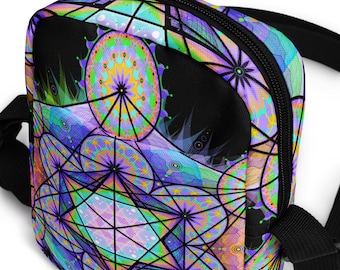 May include: A colorful, geometric-patterned bag with a black zipper and strap. The design features a kaleidoscope of shapes in shades of purple, green, blue, and yellow. The bag is a compact size, suitable for carrying small items.