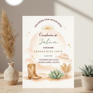 May include: A watercolor invitation card with a rustic theme. The card features text that reads "Cumpleaños 40 Julia" and "YEEHAW!" with illustrations of cowboy boots, a hat, and desert plants. The card is set against a neutral background.