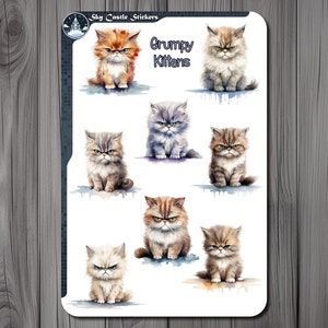 May include: A sheet of stickers featuring watercolor illustrations of grumpy kittens. The stickers are white with a blue border and the text "Grumpy Kittens" in blue.