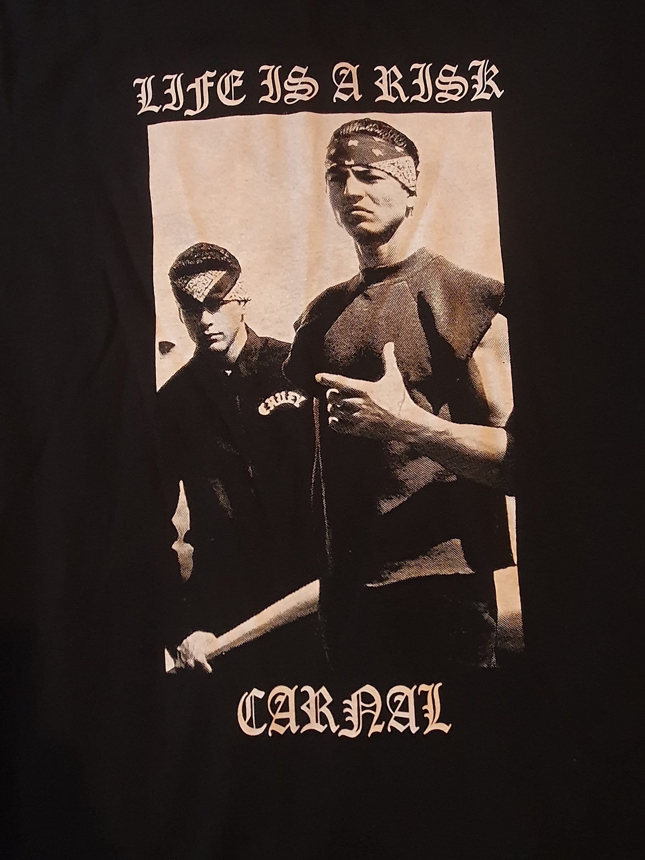 Blood in blood out. Chicano style T-shirt. Screen printing.