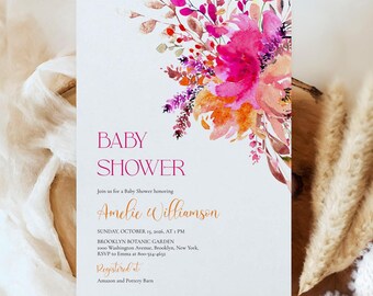May include: Baby shower invitation with watercolor floral design in pink, orange, and purple hues. The invitation includes event details and the name Amelie Williamson. The invitation is on a white background with baby booties and decorative elements.