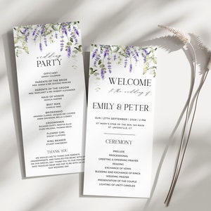 May include: Two wedding ceremony programs with lavender floral accents. The programs feature the text "Wedding Party" and "Welcome to the wedding of Emily & Peter". The programs are printed on white paper.