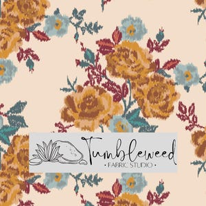 May include: Fabric with a floral pattern featuring large, stylized roses in shades of gold and rust, accented by teal and burgundy leaves and smaller flowers. The background is a light beige. The text "Tumbleweed • FABRIC STUDIO •" is displayed.