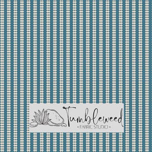 May include: A fabric pattern featuring vertical stripes of small, off-white diamonds against a teal blue background. The design includes the text "Tumbleweed Fabric Studio" in a rectangular label.
