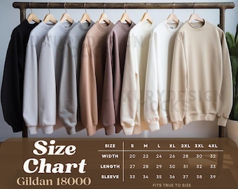 May include: A selection of crewneck sweatshirts in a range of neutral tones, suspended on wooden hangers. The sweatshirts vary in colour from black to cream. A size chart is included, with measurements in inches, and the text "Size Chart Gildan 18000".