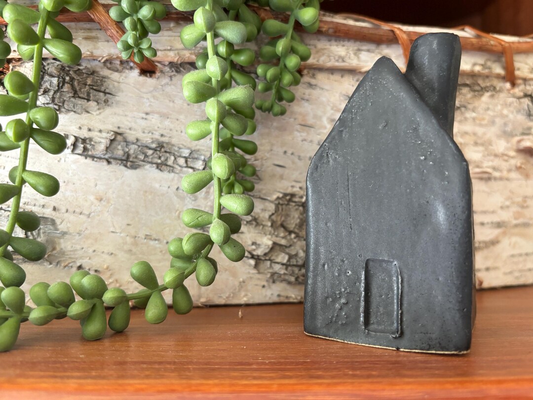 Black Ceramic Table Top House with White Roof