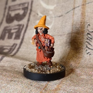 Witch/Wizard (orange robe w/ books)- Hand Painted D&D/Pathfinder/TTRPG miniature (Midlam Miniatures-metal)