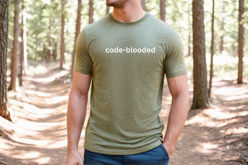 a man standing in the woods with a skateboard