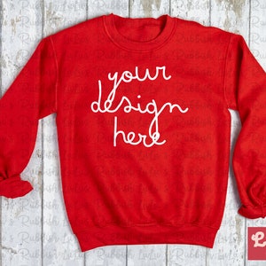 Puede incluir: Sudadera roja con el texto "your design here" en blanco.