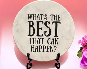 Inspirerende keramische onderzetter: bureaudecor met positieve quote en metalen standaard