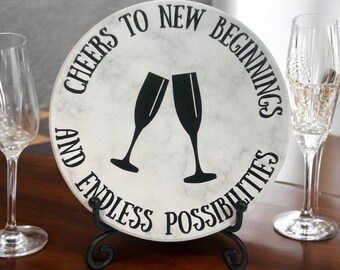 Cadeau voor collega bij vertrek, proost op een nieuw begin, keramische onderzetter en metalen standaard