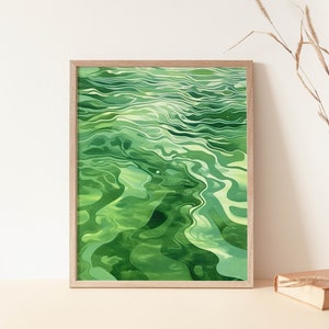 May include: Abstract watercolor painting of swirling green and white lines, resembling water ripples. The painting is framed in a light wood frame.
