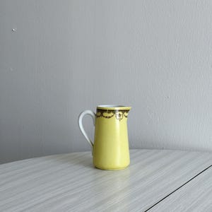 Limoges porcelain milk jug, yellow finish with vintage floral motifs, small colorful kitchen decoration, French porcelain